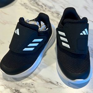 NIB Adidas Toddler size 7 shoes. Never worn only tried on and didn’t fit.
